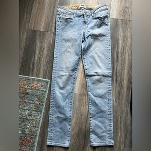Paige light blue straight leg skinny jeans.
